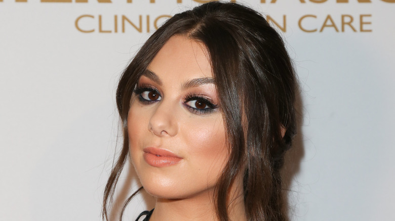 Kira Kosarin, looking serious, posing