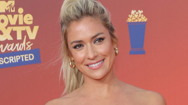 Kristin Cavallari, smiling, wearing a ponytail 