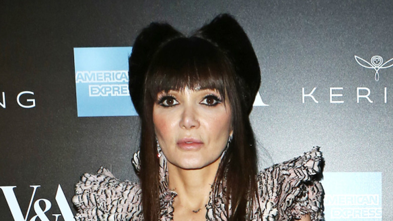 Annabelle Neilson wearing a necklace