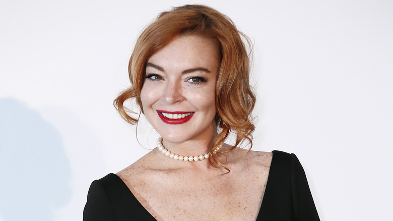 Lindsay Lohan smiling red lipstick