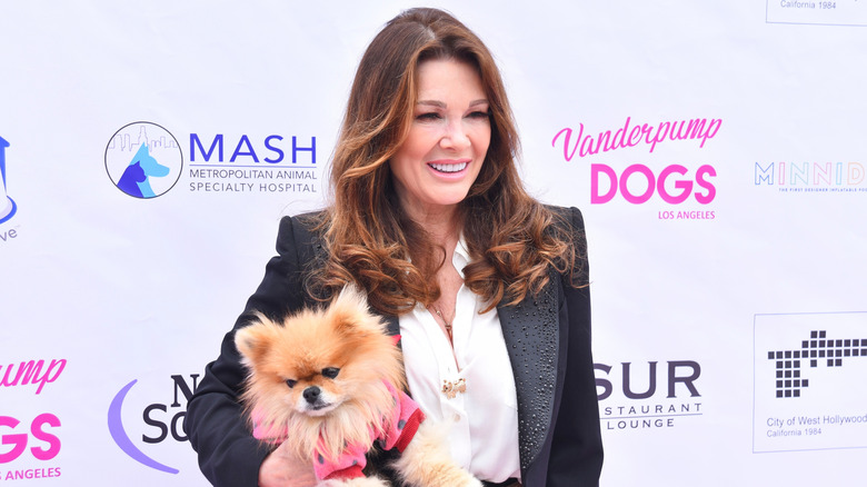 Lisa Vanderpump posing with a dog