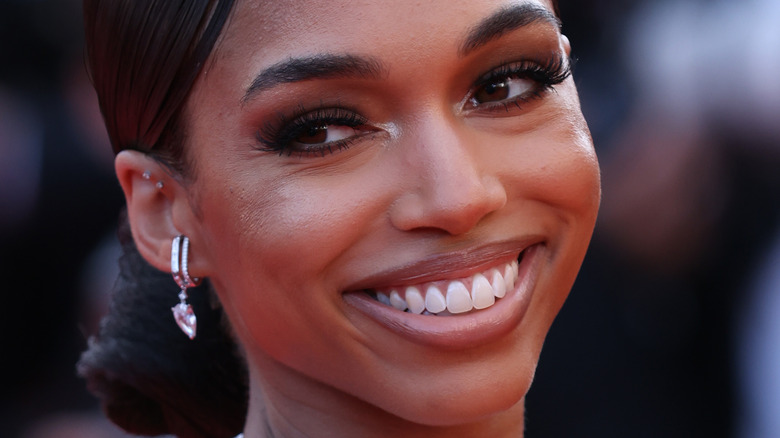 Lori Harvey smiling