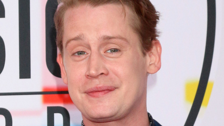 Macaulay Culkin smiling 