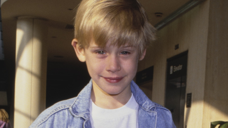 Macaulay Culkin smiling as a child 