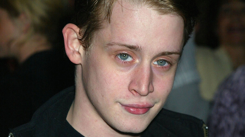 Macaulay Culkin posing 