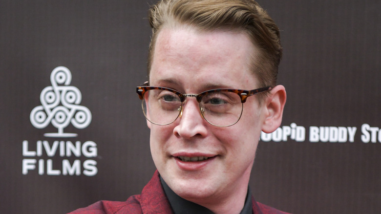 Macaulay Culkin smiling 
