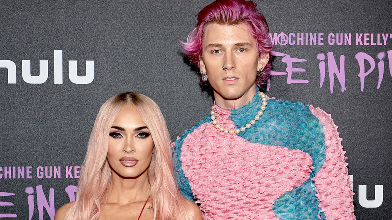Megan Fox and Machine Gun Kelly wearing pink 