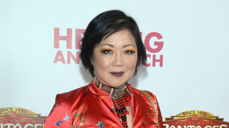 Margaret Cho with collar and red top