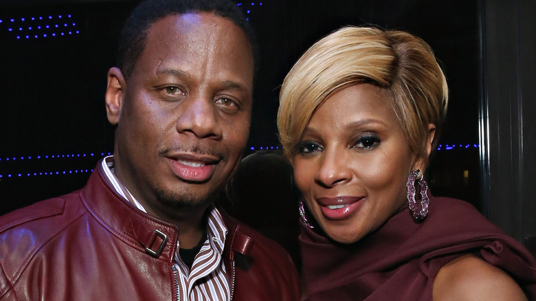 Kendu Isaacs and Mary J. Blige smiling