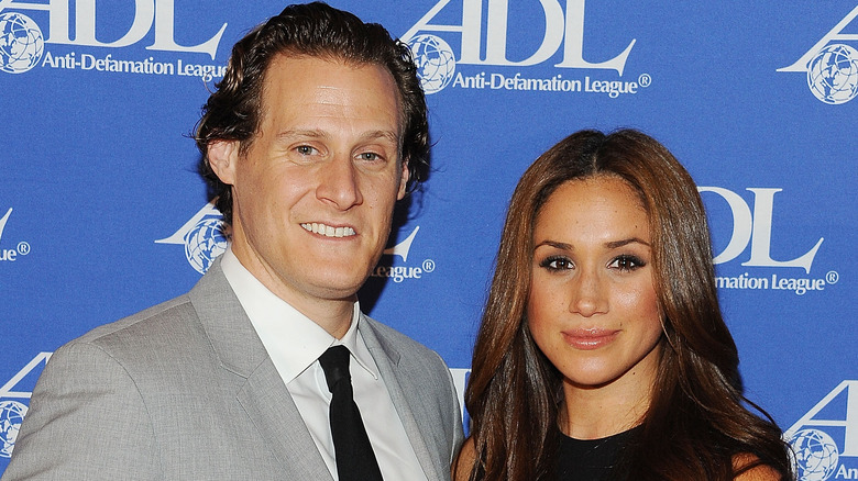 Meghan Markle posing with Trevor Engelson
