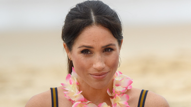 Meghan Markle smirking