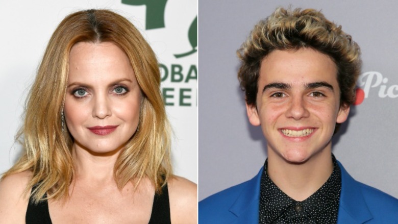 Mena Suvari and Jack Dylan Grazer, both smiling