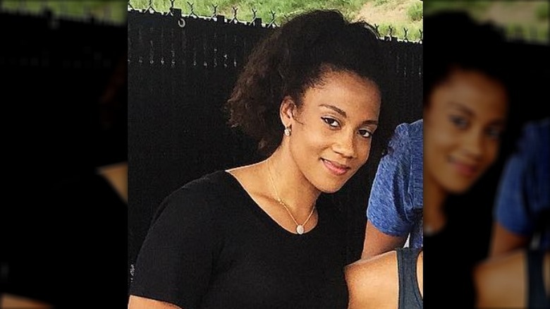 Tiffany Roy in black shirt 