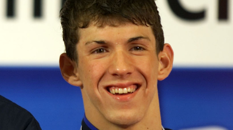 Teenage Michael Phelps smiling