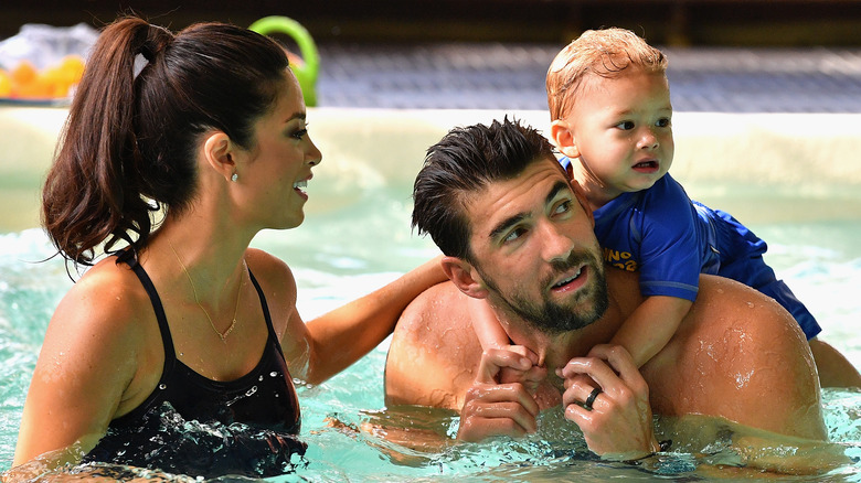 Michael Phelps swimming with wife Nicole and son Boomer