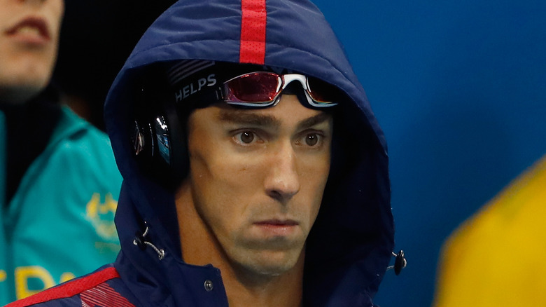 Michael Phelps with a hood up