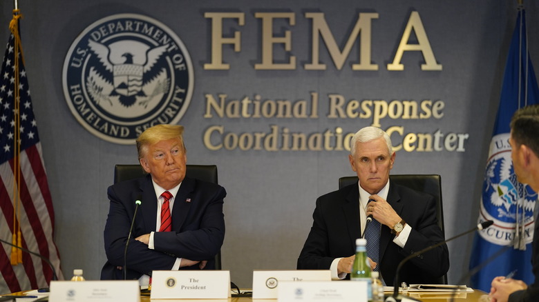 Donald Trump and Mike Pence at FEMA meeting table