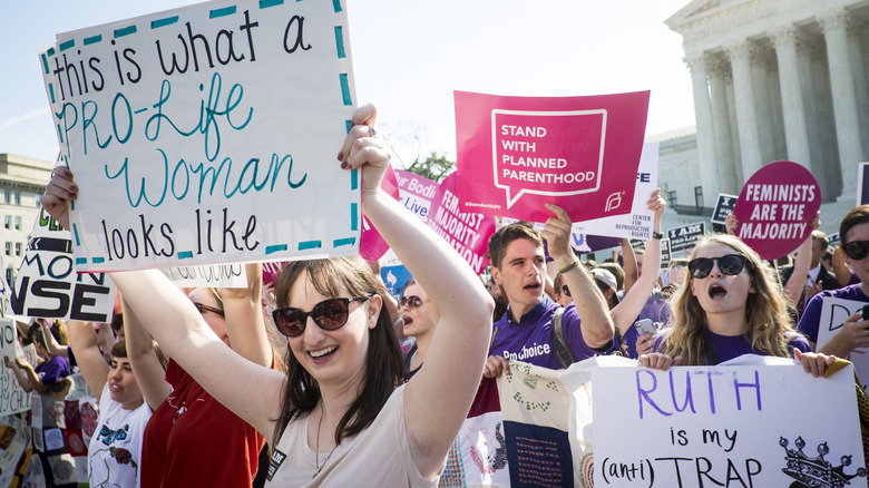 Pro-choice protestors holding signs