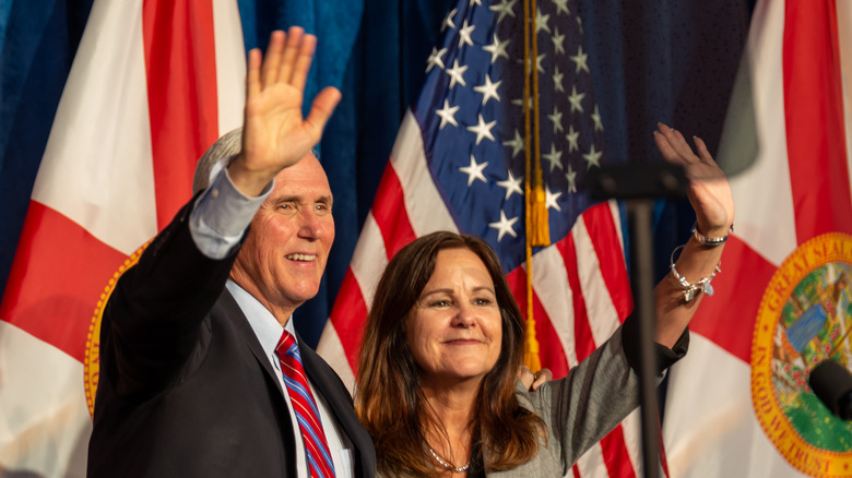 Mike Pence and Karen Pence waving