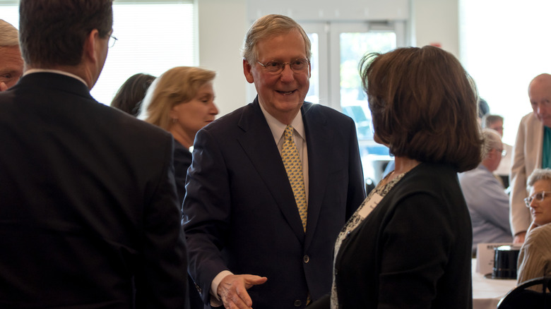 Mitch McConnell shaking hands