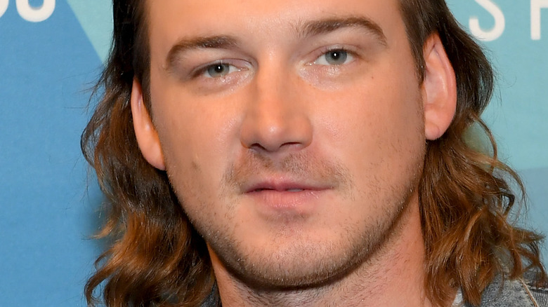 Morgan Wallen wearing a denim jacket