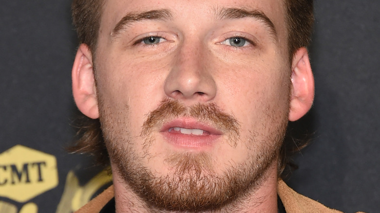 Morgan Wallen with a blank expression
