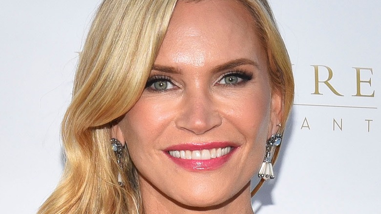 Natasha Henstridge smiling on red carpet