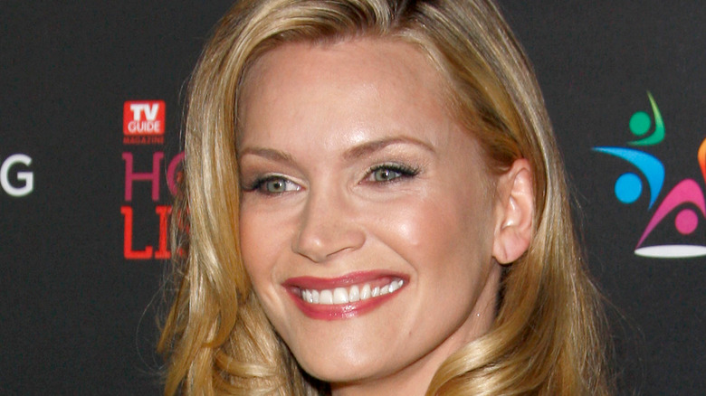 Natasha Henstridge smiling on red carpet