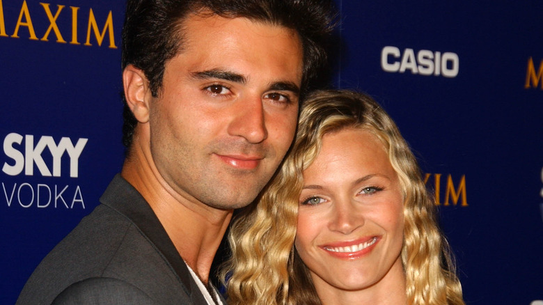 Darius Campbell and Natasha Henstridge smiling