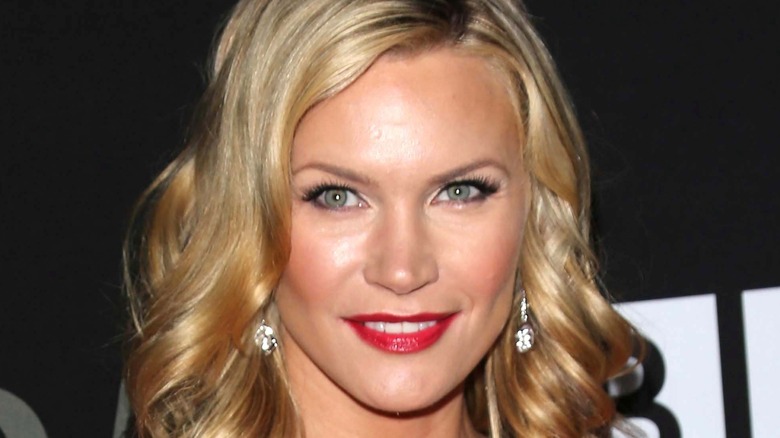 Natasha Henstridge smiling on red carpet