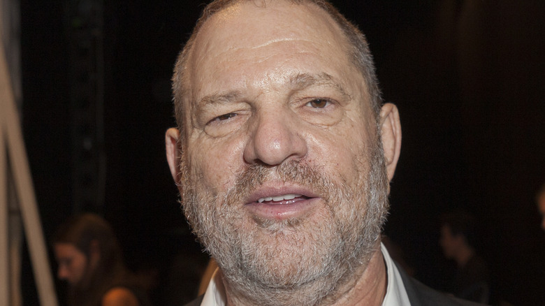 Harvey Weinstein posing for cameras