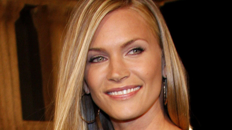 Natasha Henstridge smiling on red carpet