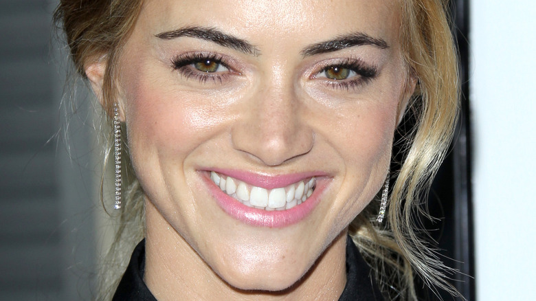 Emily Wickersham smiles