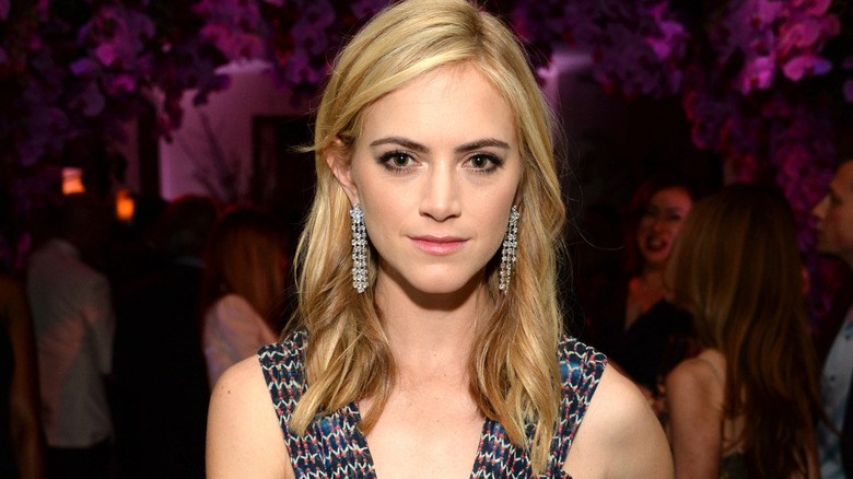 Emily Wickersham with purple background