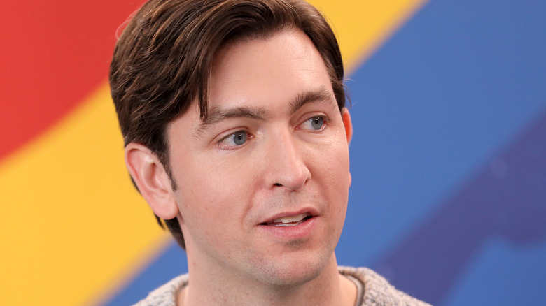 Nicholas Braun being interviewed