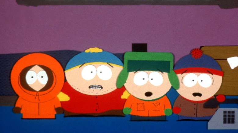 Stan Marsh, Kyle Broflovski, Kenny McCormick and Eric Cartman standing together