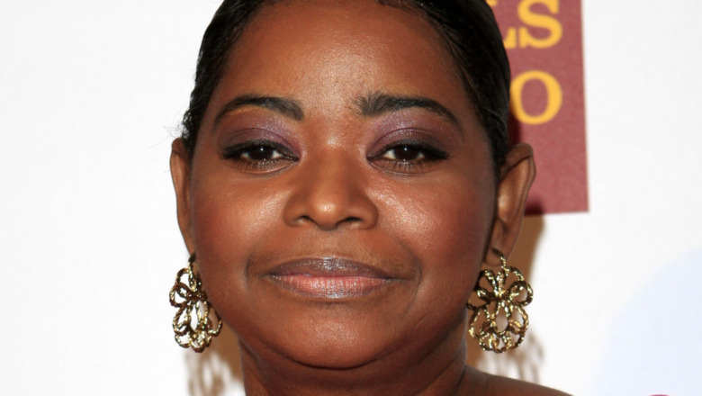 Octavia Spencer smiling slightly 
