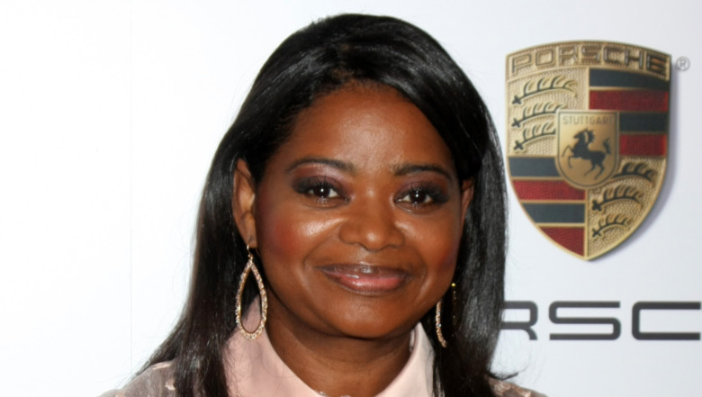 Octavia Spencer smiling slightly 