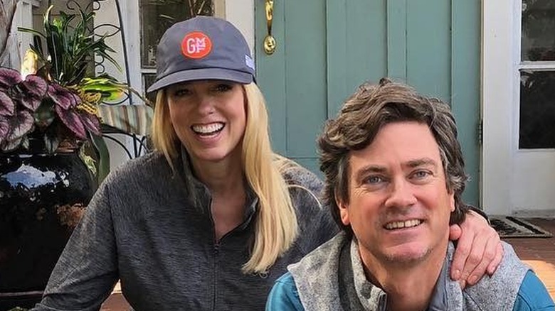 Pam Bondi and John Wakefield posing for cameras