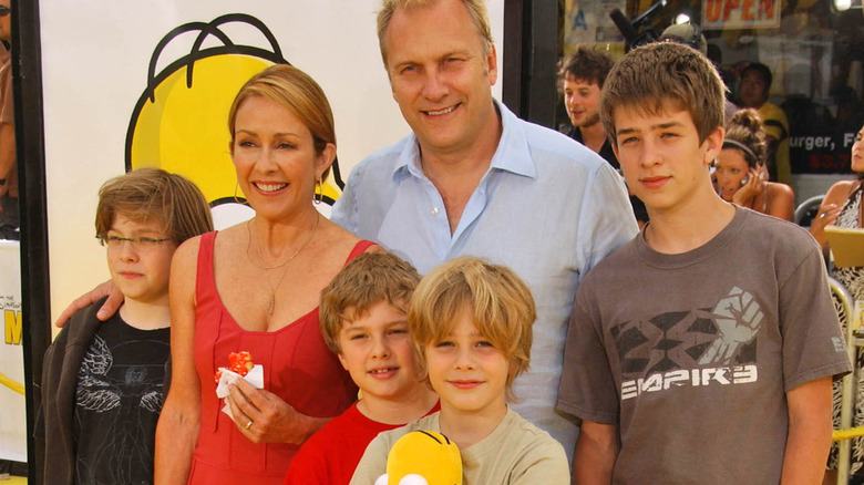 Patricia Heaton and family posing at The Simpsons Movie premiere