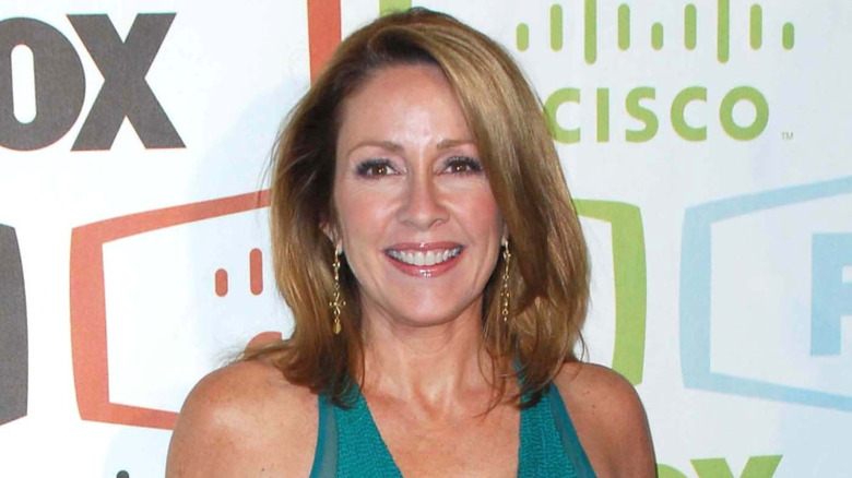Patricia Heaton in turquoise dress