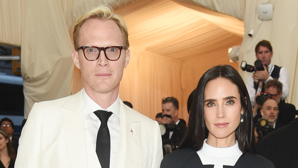 Paul Bettany and Jennifer Connelly smiling at the Met Gala