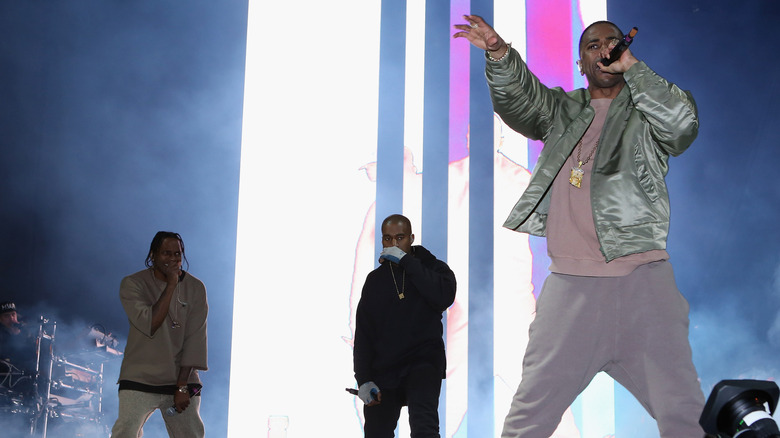 Pusha T and Kanye West on stage, performing