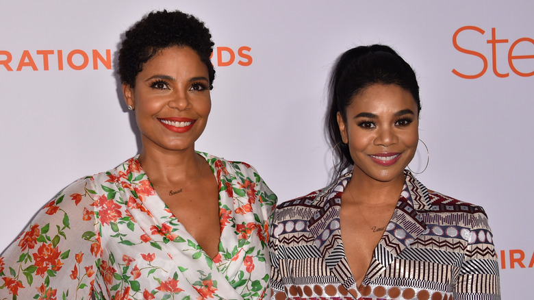 Sanaa Lathan and Regina Hall smiling