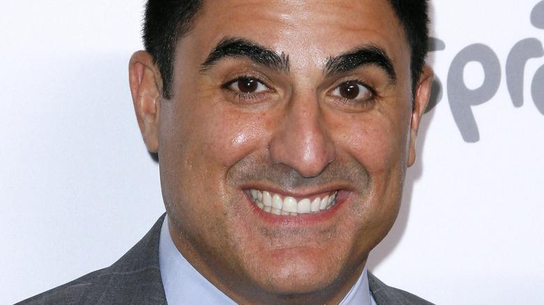 Reza Farahan posing for cameras