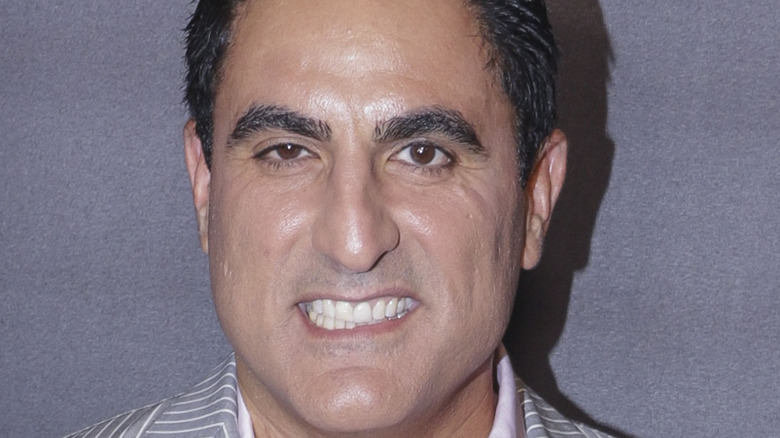 Reza Farahan posing for cameras