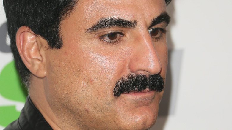 Reza Farahan posing for cameras