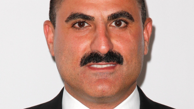 Reza Farahan posing for cameras