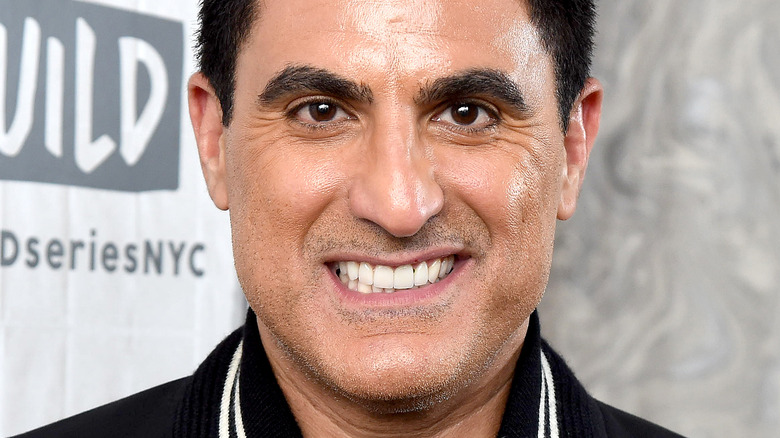 Reza Farahan posing for cameras