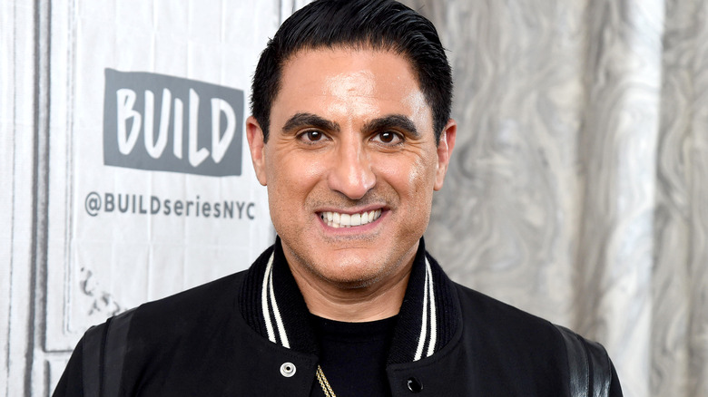 Reza Farahan posing for cameras